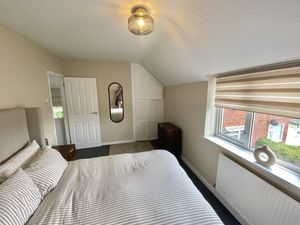 Bedroom One- click for photo gallery